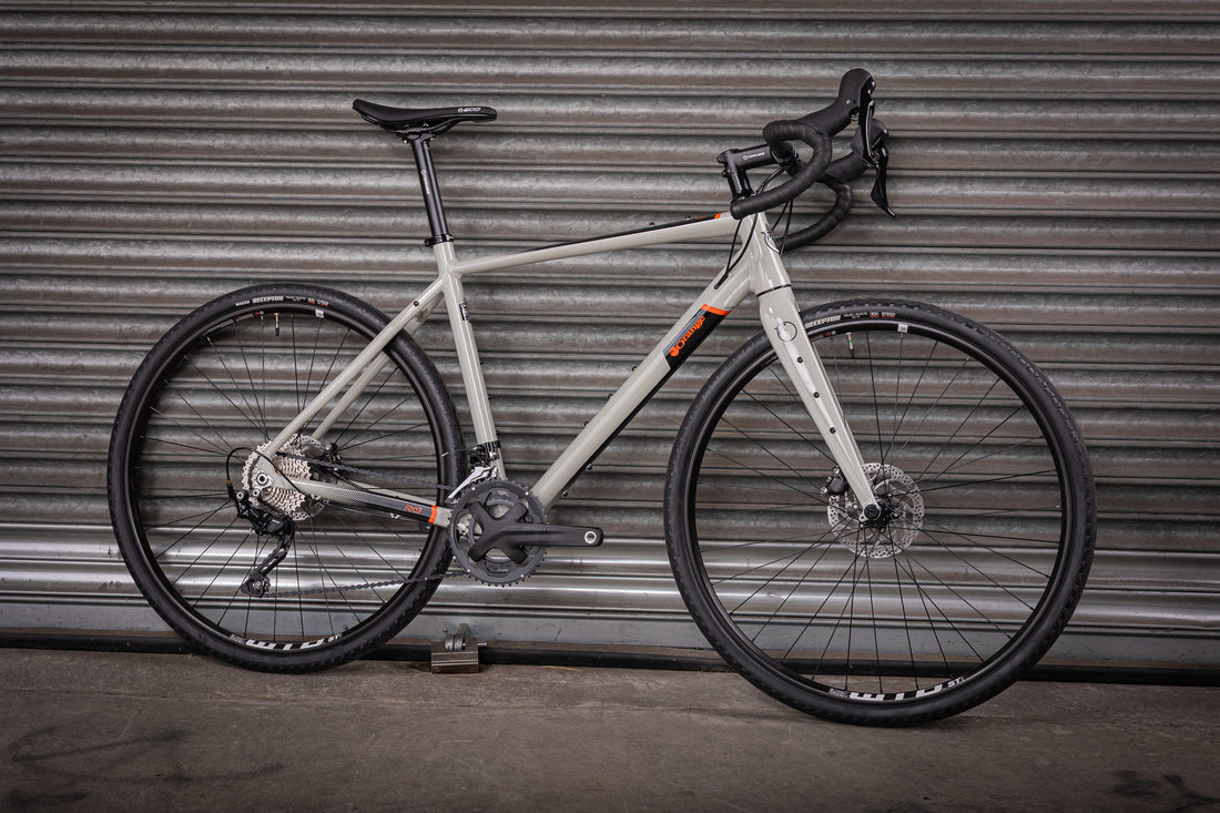 RX9 PRO 700c - Orange Bikes